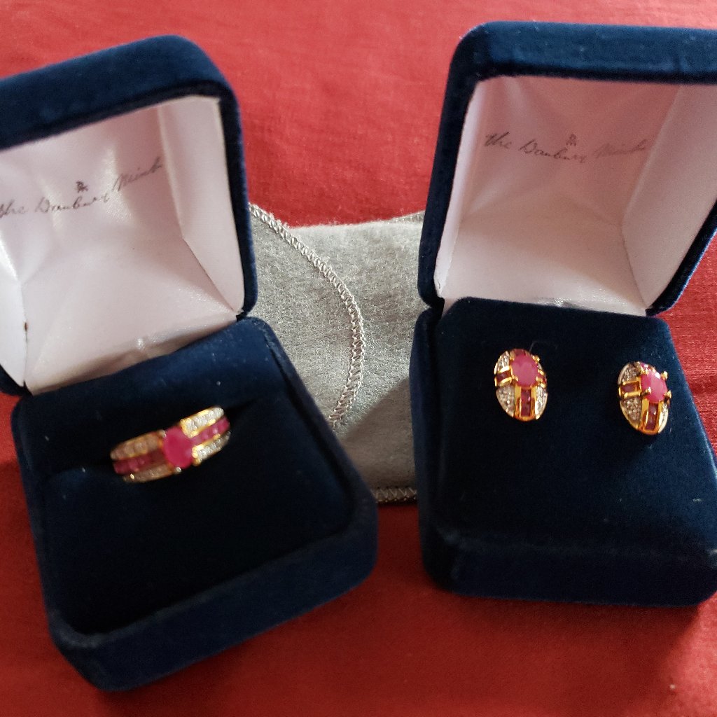 - Danbury Mint Fire Ice Ruby Ring And Earrings 125$